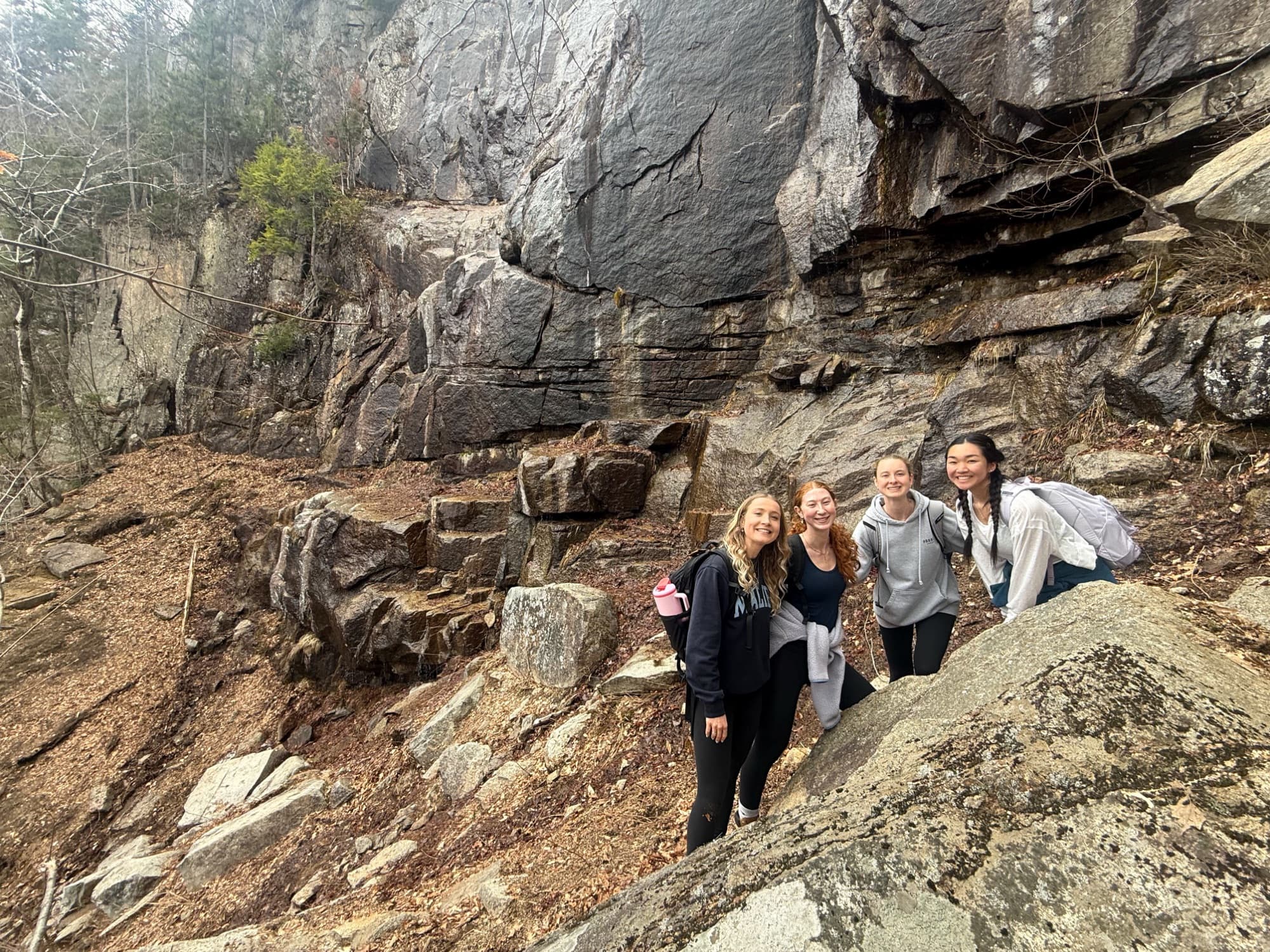 Members below the cliffs near Arethusa Falls